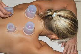 Cupping therapy session to release muscle tension and improve circulation at Ria's Touch Massage in Shelby Township, MI